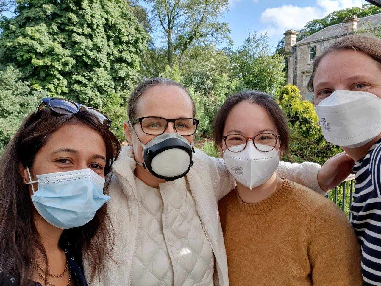 Selfie with 4 persons with a face mask